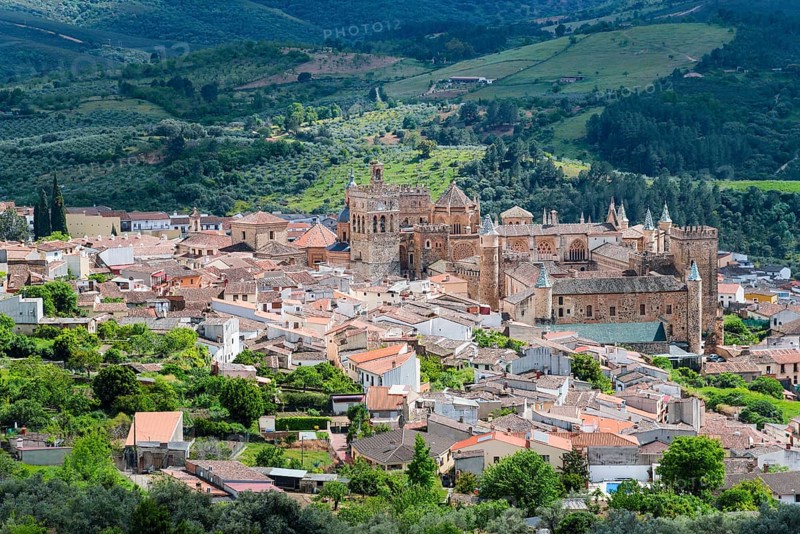 Views of the old town centre with characteristic architecture and green hills in the background, Guadalupe, Cáceres province, Caceres, Extremadura, Spain, Europe