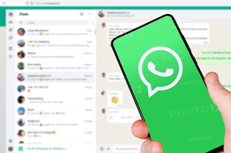 WhatsApp logo messenger app on a mobile phone smartphone and computer in Stuttgart, Germany, Europe