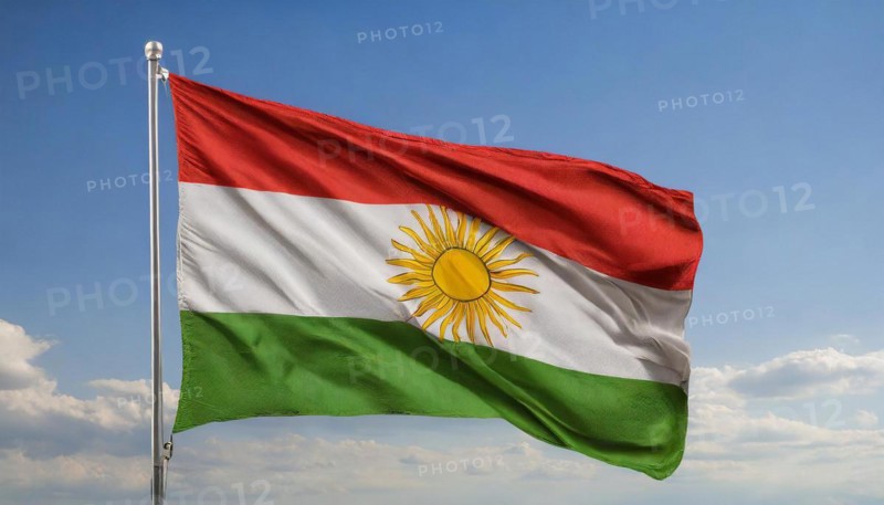 The flag of Kurdistan flutters in the wind