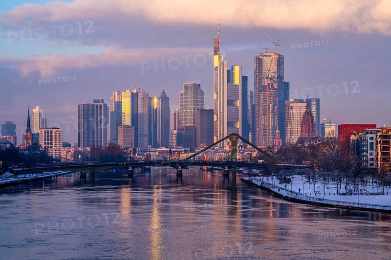 The skyline of Frankfurt am Main, skyscrapers of the banking district, Flößerbrücke, wintry morning, Hesse, Germany, Europe