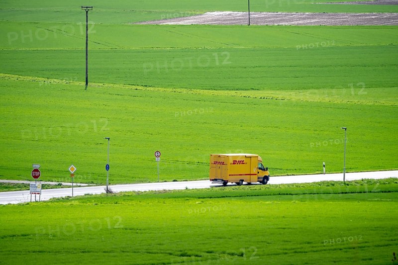 B519 country road near Flörsheim, DHL parcel service van, Hesse, Germany, Europe