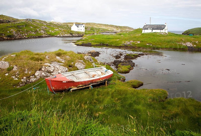Small fishing boat on the east coast of Barra, Outer Hebrides, Scotland, UK