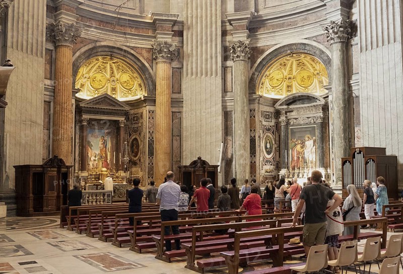 Praying at the altar of St Joseph, St Peter's Basilica, San Pietro in Vaticano, Basilica of St Peter in the Vatican, Rome, Italy, Europe