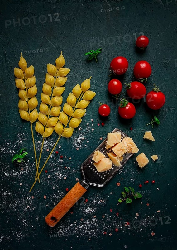 Food concept, pasta, with cherry and parmesan cheese, top view, no people, wheat, pasta spikelets