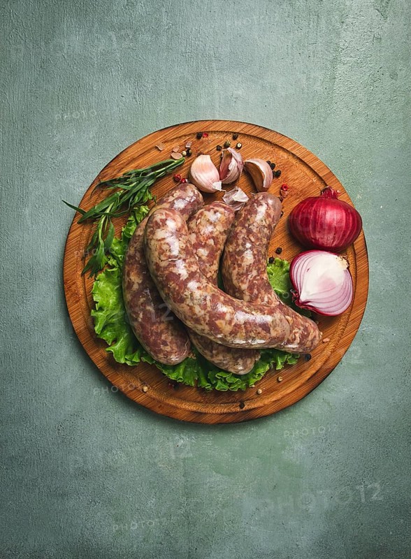 Raw kupaty, traditional Georgian sausages, raw sausages, with spices and herbs, Georgian cuisine