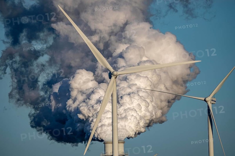 Chimneys, smoke plume of the RWE coal-fired power plant Eemshavencentrale, wind power plant, in the seaport of Eemshaven, operator RWE Power, Netherlands