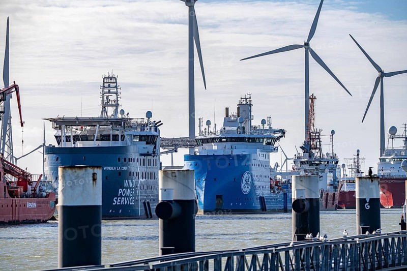 Offshore working vessels, Buss Terminal Eemshaven, logistics hub for the offshore wind farm industry, from here new wind farms in the North Sea are supplied with equipment, monopiles and transition pieces, which are anchored in the seabed and form the platform for the actual wind turbines, in the industrial harbour of Eemshaven, wind farm, Groningen, Netherlands