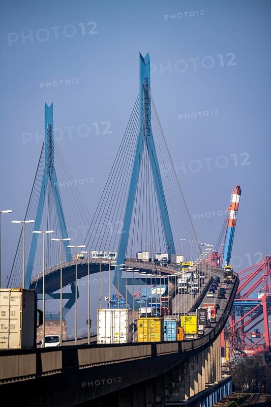 Traffic on the Köhlbrand Bridge in the port of Hamburg, spans the 325 m wide Köhlbrand, an arm of the Süderelbe, the bridge is over 3600 metres long, 53 metres above the water, piers 135 m high, more than 30, 000 vehicles use the B3 bridge daily, important connection to the port, it is dilapidated, to be rebuilt, Hamburg, Germany, Europe