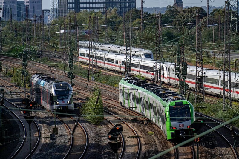 Railway tracks in front of Essen main station, ICE 2 train and ICE 4, behind, on the tracks, S-Bahn train, town hall, North Rhine-Westphalia, Germany, Europe