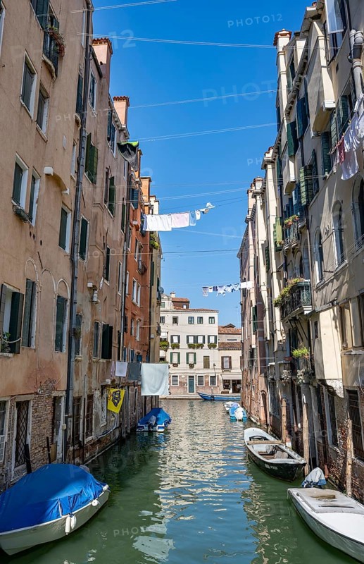 Clotheslines across a canal in the Cannaregio district, Venice, Veneto, Italy, Europe