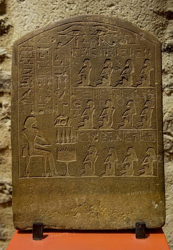 Funerary slab stele showing Egyptian offerings' scene and hieroglyphs dating to the late 12th Dynasty