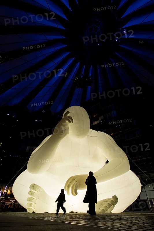 Illuminated Denker statue in the Sony Center at Potsdamer Platz for the Festival of Light, Berlin, 03/10/2024