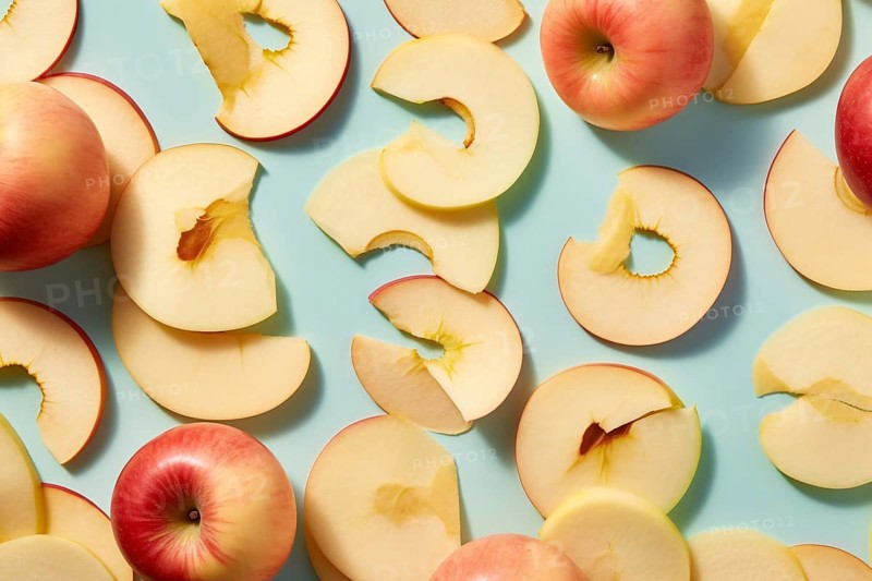 Top view of apples fruits and slices on blue background. KI generiert, generiert AI generated
