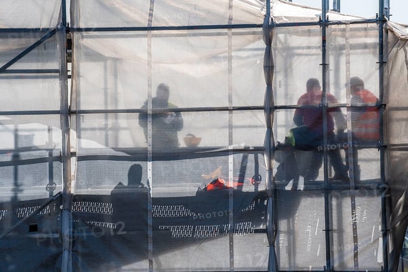 Construction site, scaffolding, work on scaffolding, lunch break, bridge piers Germany
