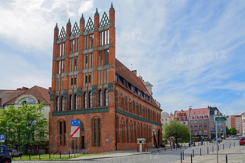 A Gothic-style brick building under a partly cloudy sky, Old Town Hall, Ratusz Staromiejski, Old Town, Szczecin, Szczecin, West Pomeranian Voivodeship, Poland, EuropeA Gothic-style brick building under a partly cloudy sky, Europe