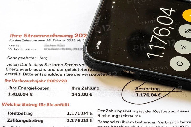 Symbolic image of electricity bill, billing of an electricity provider, additional payment due to increased energy costs and also consumption of electricity