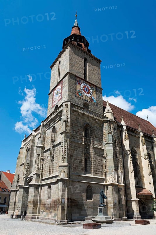 Gothic church with tower under clear blue sky, large clock visible, Black Church, Old Town, Brasov, Brasov, Transylvania, Romania, Europe
