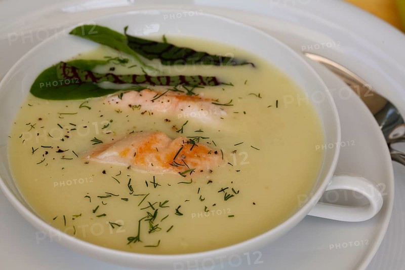 Southern German cuisine, sorrel soup with char, freshwater fish, soup served in soup bowl, herbs, fresh sorrel, blood sorrel, dill, toothpick, savoury, salty, traditional cuisine, food photography, studio, Germany, Europe