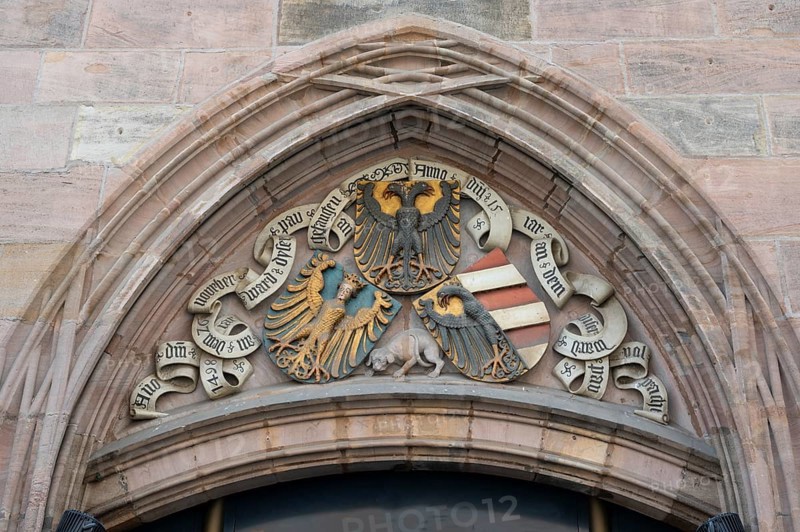 East side with coat of arms above the entrance gate, historic toll hall, built 1498-1502, former granary, Hallplatz 2, Nuremberg, Middle Franconia, Bavaria, Germany, Europe