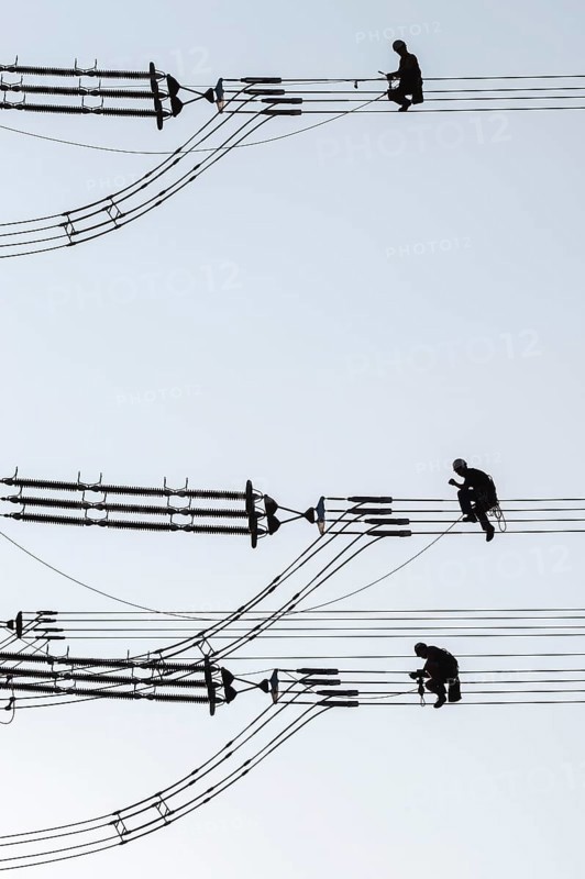 Overhead line fitters working on a high-voltage pylon, overhead lines, energy, worker, high-voltage electrician, Baden-Württemberg, Germany, Europe