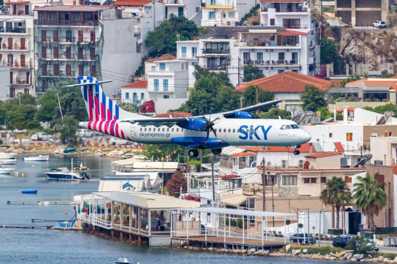 An ATR 72-600 Sky Express aircraft with the registration SX-FIT at Skiathos Airport, Greece, Europe