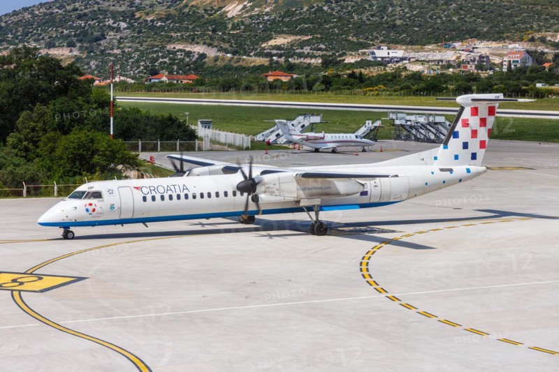 A De Havilland Canada Dash 8 Q400 aircraft of Croatia Airlines with registration 9A-CQF at Split Airport, Croatia, Europe