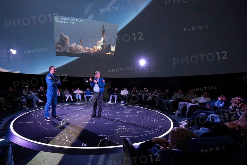 Astronaut Marco Sieber and astronaut Claude Nicollier Planetarium Swiss Museum of Transport, Lucerne, Switzerland, Europe