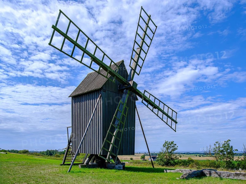 Three traditional historic windmills (Resmo väderkvarnar) in the village of Resmo on Öland, Kalmar län, Sweden, Scandinavia, Europe