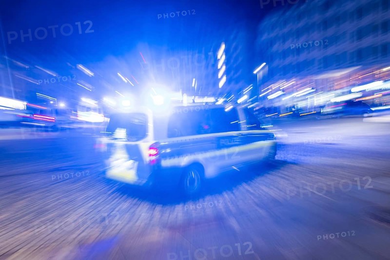 A police vehicle in action, with blue light switched on, Dresden, Saxony, Germany, Europe