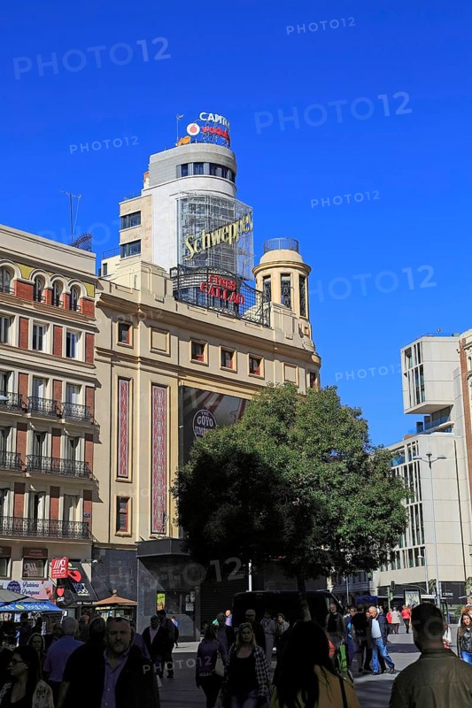 Buildings neon advert signs on Callao plaza square in Madrid city centre, Spain, Europe