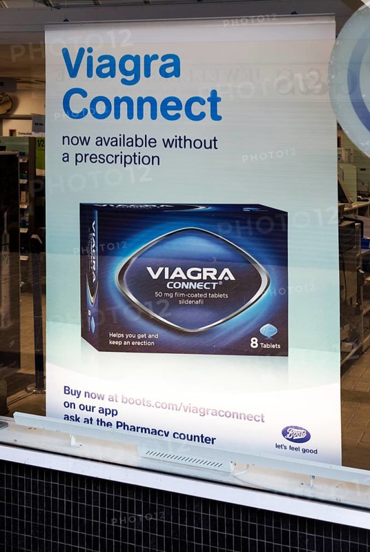 Boots chemist shop window Viagra Connect advertising poster, Calne, Wiltshire, England, UK