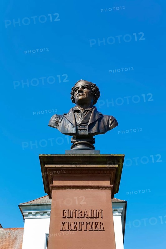 Monument in honour of Conradin Kreutzer, musician, conductor and composer, bust by Hans Baur, sculptor, sculpture, portrait, portrait, head, face, detail, pedestal, writing, letters, public art, statue, Meßkirch, district of Sigmaringen, Baden-Württemberg. Germany