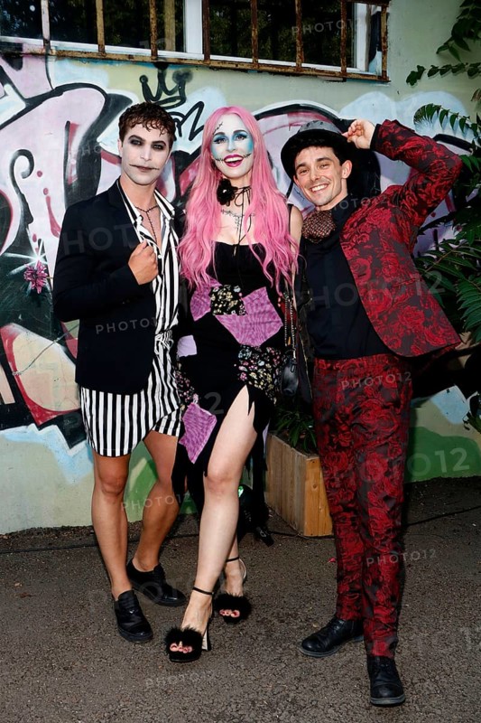 Julian David, Undine Lux and Marc Weinmann at the opening of the Tim Burton exhibition at the Radsetzerei on the RAW site in Berlin on 18 July 2024