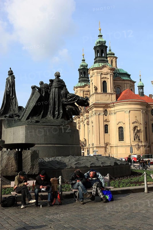 Jan Hus Monument on Old Town Square and the baroque St Nicholas Church, Prague, Czech Republic, Europe
