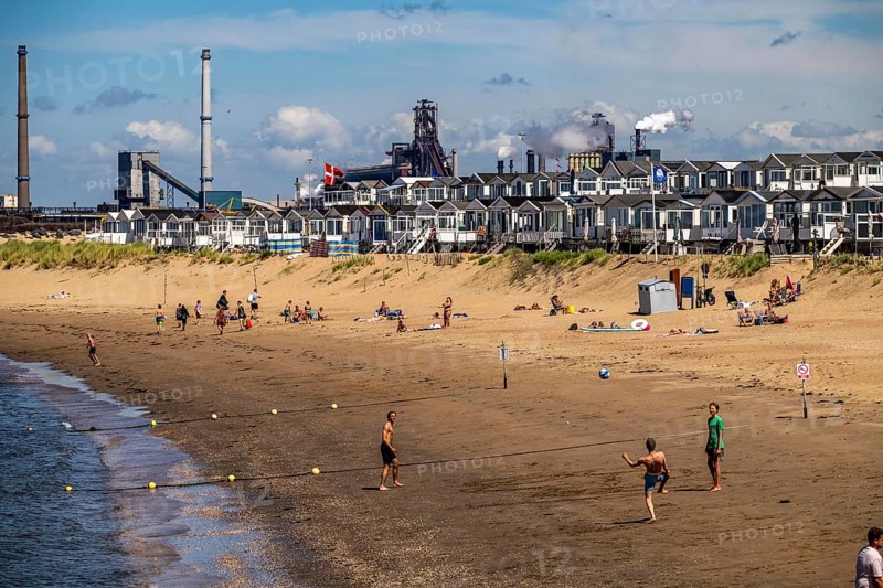 The Tata Steel steel and smelting works in IJmuiden, Velsen, North Holland, Netherlands, largest industrial area in the Netherlands, 2 blast furnaces, 2 coking plants, rolling mills, directly on the North Sea, beach houses near Ijmuiden aan Zee