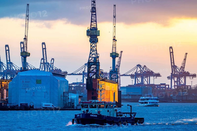 Port of Hamburg, view of the Blohm + Voss shipyard, Dock 11, evening, cranes of the container terminals, Hamburg Germany