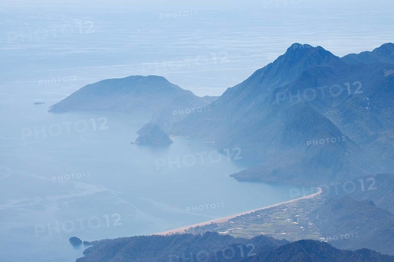 View of the Turkish Riviera from the snow-covered Tahtali Dagi, Turkey, Asia