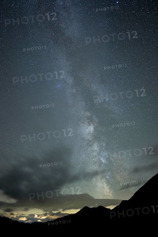Milky Way and starry sky with Montafon mountains, Tschagguns, Rätikon, Montafon, Vorarlberg, Austria, Europe