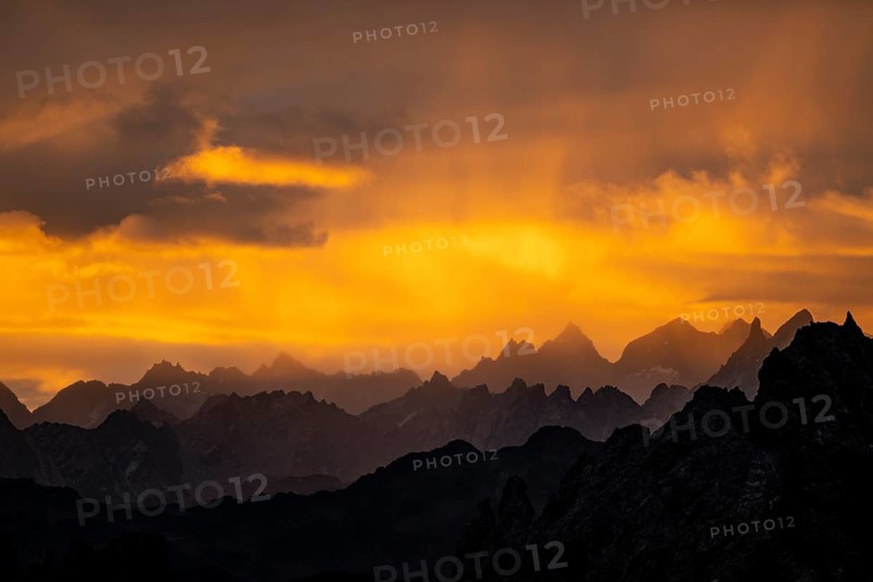 Montafon mountains with dramatic cloudy sky at sunrise, Tschagguns, Rätikon, Montafon, Vorarlberg, Austria, Europe