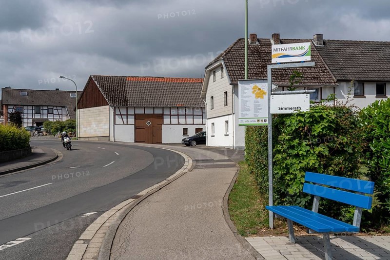 Carpool bank, people can wait here for a lift, your destination is indicated by a selection of place name signs, Eifel, Schmidt, North Rhine-Westphalia, Germany, Europe