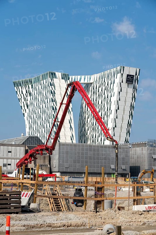 The Bella Sky Hotel, four-star hotel, at the Bella Centre complex, in the Ørestad district, many new buildings, construction site in the district, Copenhagen, Denmark, Europe