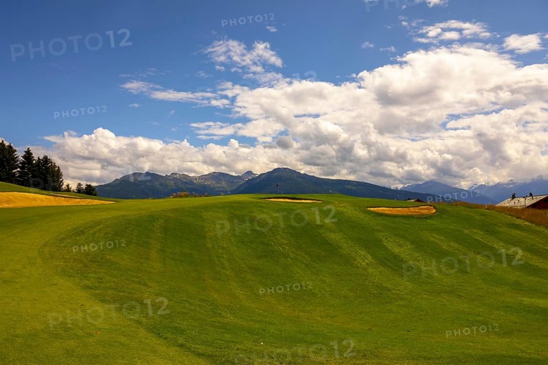 Crans Sur Sierre Golf Course with Hole 7 and Mountain View in Crans Montana in Valais, Switzerland, Europe
