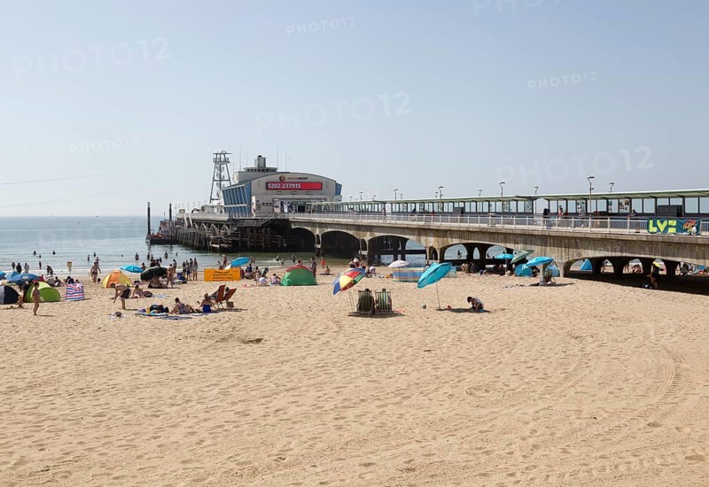 The pier and sandy beach at Bournemouth, Dorset, England, UK
