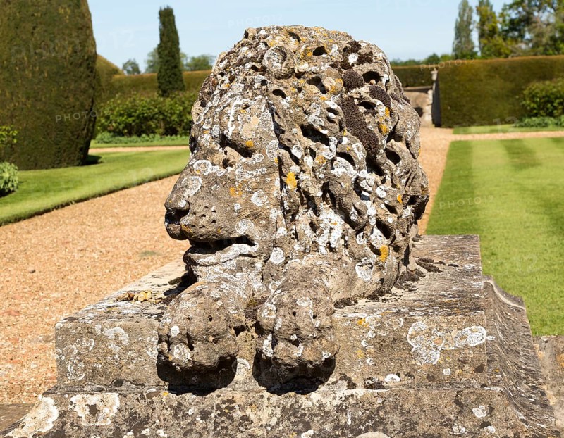 Stone lion sculpture terrace garden Bowood House and gardens, Calne, Wiltshire, England, UK
