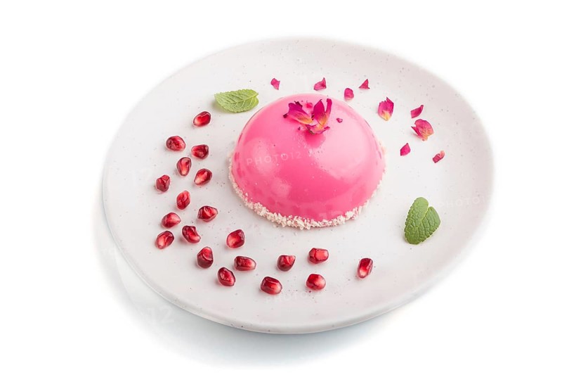 Pink mousse cake with strawberry isolated on white background. top view