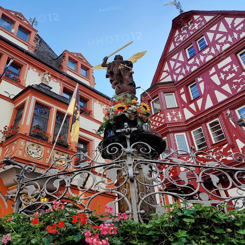 St Michael's Fountain with town hall and gabled half-timbered house, medieval market square, old town, Bernkastel-Kues, Middle Moselle, Rhineland-Palatinate, Germany, Europe