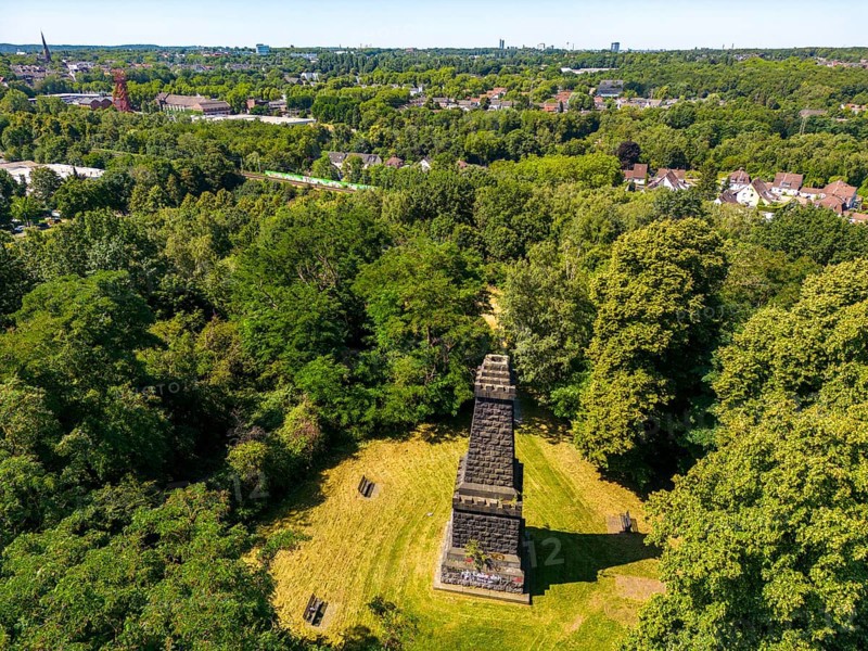 The Mechtenberg in Essen, one of the few natural elevations from the ice age in the Ruhr area, was once 100 metres above sea level, but due to mining subsidence it is now only around 80 metres above sea level, Bismarck Column, view to the west towards Essen, part of the Mechtenberg Landscape Park, North Rhine-Westphalia, Germany, Europe