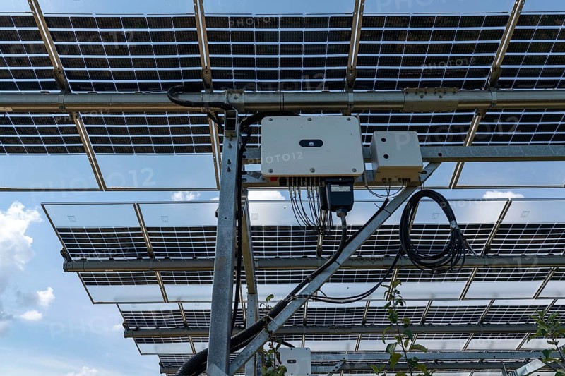 Inverter, agri-photovoltaic test plant, an apple orchard with two different systems of PV modules was roofed over 3000 square metres, rain and sunlight comes through, at the same time protection against hail and heavy rain, next to it are the same trees but without a solar roof, as a comparison object, how the PV roof affects the trees and harvest, the field test is accompanied by the Fraunhofer Institute for Solar Energy Systems ISE, in Grafschaft-Gelsdorf, Rhineland-Palatinate, Germany, Europe