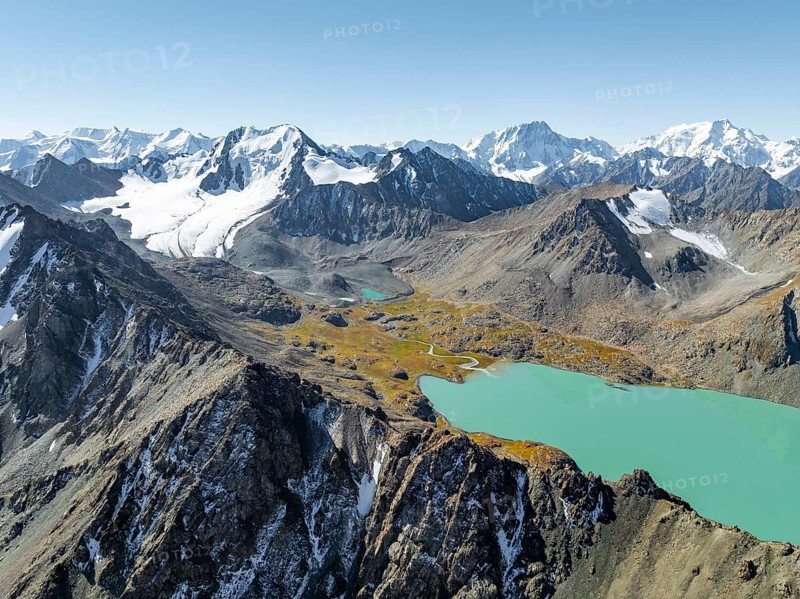 Mountain panorama, aerial view, 4000 metre peak with glacier, mountain pass and mountain lake Ala-Kul Lake, Tien Shan, Kyrgyzstan, Asia