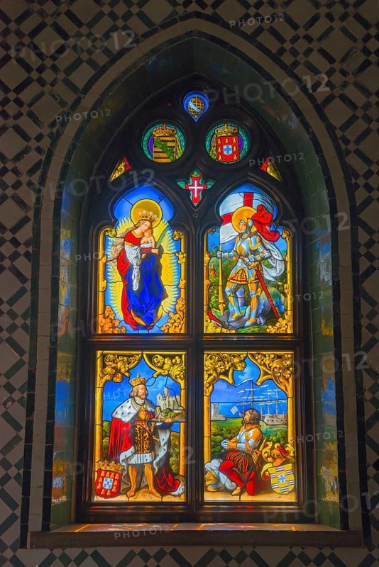 A colourful stained glass window with religious and medieval scenes, depicted in a Gothic stained glass work, Palácio Nacional da Pena, Pena National Palace, Sintra, Lisbon, World Heritage Site, UNESCO, Portugal, Europe